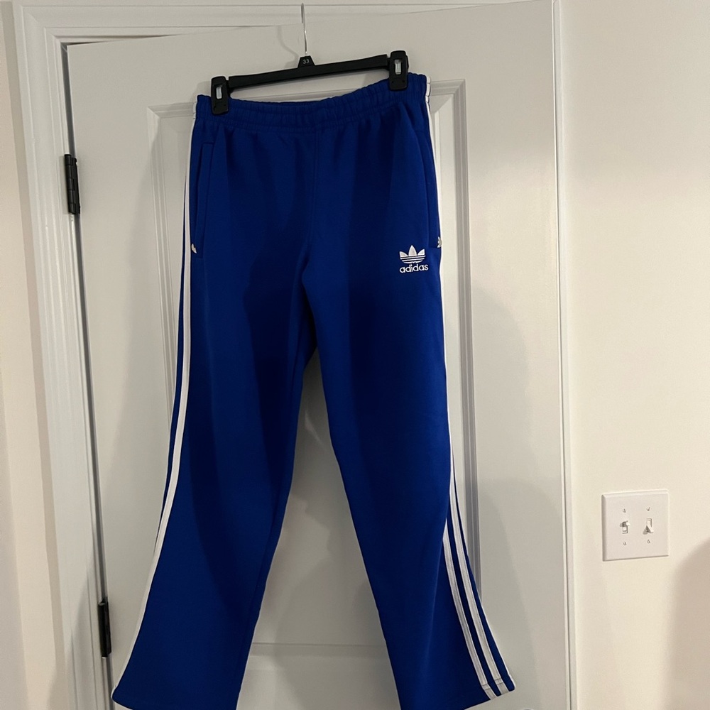 Adidas women’s Royal Blue Joggers with White Stripes